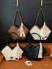 Bolsa Casual de Grande Capacidade para Uso Diário Feminino 2025 Novo Estilo Cor Contrastante Acolchoada Tecida Bolsa Tote Fashionável Bolsa de Ombro