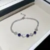Pulsera de zirconita con forma de cruz de moda para mujer, nicho de lujo ligero de alta gama, joyería versátil de moda al por mayor