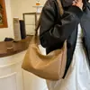 Bolso de Hombro tipo Tote Tejido de Cuero Suave Vintage de Nicho Modelo Nuevo 2026 Bolso de Mano Simple de Gama Alta para el Trabajo