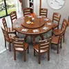 Mesa de jantar redonda de madeira maciça estilo chinês, adequada para uso doméstico, com cooktop de indução embutido e bandeja giratória, também disponível como mesa de jantar redonda esculpida estilo hotel