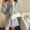 Bolso de nicho transfronterizo 2026 nuevo estilo moderno simple color liso de moda casual para el día a día un solo hombro personalidad axila cruzada mujer