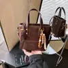 Bolso de Gamuza con Estampado de Leopardo para Mujer Otoño e Invierno 2025 Nuevo Casual Diseño de Nicho Retro Bolso de Hombro Cruzado Cubo