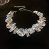 Traje de collar y pendientes de diamante ovalado europeo y americano exagerado luz de lujo alta gama cadena de clavícula nicho moda joyería al por mayor
