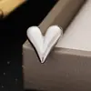 Pendientes de Acero Inoxidable con Lazo y Corazón para Mujer, Ins Europeo y Americano Transfronterizos Nueva Moda Lujo Ligero Minimalistas Versátiles