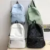 Mochila escolar transfronteriza, diseñada para chicas de secundaria, con un estampado de estrellas fresco y lindo, una mochila versátil adecuada para estudiantes de preparatoria y salidas diarias.