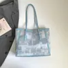 Bolsa de Ombro Feminina Nova Tendência para o Verão Este Ano 2026 Bolsa Tote Grande Capacidade para o Dia a Dia Bolsa de Mão Fashion Simples