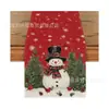 Nuevo camino de mesa navideño transfronterizo con estampados de muñeco de nieve invernal y campanas, hecho de lino, para crear una decoración festiva de mesa navideña