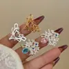 Diseño de Nicho Metalizado Mate Dorado Corazón Hueco Dulce Fresco Anillo Floral Vintage Microincrustado Circonita de Colores Anillo Apilable para Mujeres