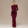 2025 Ropa de Mujer Europea y Americana Transfronteriza Otoño e Invierno Nuevo Color Puro Elegante Manga Larga Plisado Ajustado al Cuerpo Ceñido a la Cadera Vestido Largo para Mujer