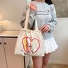 Bolsa de tela ligera de cordón para el verano para estudiantes, Bolso de hombro versátil para ir al trabajo, Bolso tote simple de nicho de gran capacidad