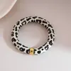 Pulseras Redondas de Acrílico Estampado Transfronterizas Europeas y Americanas, Pulseras de Moda, Sencillas, Personalizadas, Versátiles con un Diseño Único, Accesorios de Mano de Nicho
