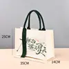 Bolsas de lona personalizadas transfronterizas con un toque de alta gama, bolsas de regalo navideñas, bolsas de lona promocionales para empresas