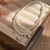 Collar de perlas con estrella de cuentas estilo francés, lujo ligero, alta moda, cadena exquisita para suéter, diseño único, accesorio de nicho para mujer