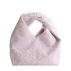 Bolsa de Mão Simples Estilo Coreano para o Dia a Dia Bolsa Dumpling para Mulheres Modelo Novo Primavera 2026 Textura de Alta Qualidade Bolsa de Embreagem de Nicho de Luxo Leve
