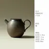 Juego de té de cerámica gruesa vidriada con detalles dorados, que incluye un cuenco con tapa de cerámica, una taza de té, una tetera con asa lateral y una taza de maestro, así como un cuenco para matcha