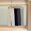 Nuevos pantalones de pierna ancha fluidos con cintura elástica MO de otoño, pantalones largos casuales transpirables y ligeros con cordón en la cintura elástica para mujer
