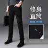 Jeans negros de alta gama que no se decoloran para hombre, pantalones rectos ajustados, pantalones largos casuales finos elásticos de otoño 2026