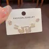 Nuevo Estilo de Primavera Exquisito Moda Versátil Estilo Chanel Mariposa Juego de Tres Piezas de Pendientes Elegantes Lujo Ligero Pendientes Sencillos Venta al por Mayor