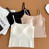 Camisola base invisible sin costuras para mujer con copas de sujetador incorporadas, adecuada tanto para llevar debajo como por encima.
