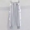 Pantalones de chándal para niñas Primavera y Otoño Nuevos Elegantes Pantalones Largos Casuales para Niños Pantalones Deportivos Versátiles de Dibujos Animados para Niñas