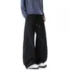 Pantalones deportivos negros para hombre con costuras de contraste, diseño cruzado, pierna ancha, cintura elástica con cordón, corte holgado, caída fluida, estilo deportivo, largo hasta el suelo para hombres jóvenes