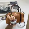 Bolso de mano de ante de nicho coreano para mujer, nuevo bolso de hombro para el día a día 2026, bolso versátil y elegante para el antebrazo