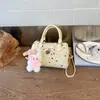 Bolso tipo Boston de diseño único para mujer, nuevo bolso de hombro cruzado de lunares verano 2026, popular bolso almohada transfronterizo