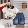 Conjunto de Verano para Niños 2026 Nueva Ropa Infantil Elegante Ropa de Bebé de Verano Camisa Polo con Letras Conjunto de Dos Piezas de Manga Corta