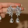 Pendientes Creativos Ecológicos Transfronterizos, Modernos y Elegantes, Incrustados con Diamantes, de Alta Gama, Pendientes de Lujo Ligero para Mujer, Pendientes Únicos y Súper Brillantes para Fiesta