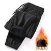 ¡Transfronterizo! ¡Directo de fábrica! Pantalones de invierno de tres defensas, a prueba de viento, resistentes a las manchas, impermeables, cálidos, de composite de doble capa, forrados de forro polar, engrosados