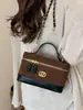 Bolsa de corrente com padrão de losangos para mulheres, novo modelo de outono 2026, super popular para o trabalho, pequena bolsa de mão, bolsa de ombro e transversal tipo balde