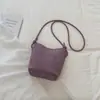 Bolso tejido Shuai Mi Jia para mujer, nuevo bolso de cubo retro de moda de tendencia otoño 2026, bolso cruzado para teléfono, bolso de hombro