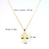 Collar con colgante de corazón y trébol de cuatro hojas con textura dorada brillante de imitación de oro, acero de titanio, moda femenina, joyería de venta caliente transfronteriza