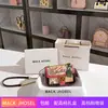 Una generación de moda moda nicho cadena graffiti bolso 2024 alta sensación de color bolso cuadrado pequeño venta al por mayor