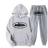 Sudadera con Capucha y Pantalón Casual con Estampado Clint419 Patrón Prisión del Diablo Europeo y Americano Conjunto de Dos Piezas para Hombre y Mujer