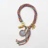 Cuerda de mano tejida a mano thangka de Xizang ocho santos patrones thangka cuerda de mano tejida a mano cuerda de mano de hilo de algodón multicolor marea nacional