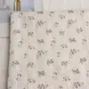 Tela jacquard a rayas de algodón puro estilo coreano con estampado de flores pequeñas para ropa infantil, cortinas, faldas, diademas, coleteros y proyectos de bricolaje