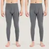 Calentadores largos para hombre de color liso sin bolitas cintura alta otoño Calentadores largos ropa interior para hombre leggings