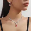 Conjunto de dos piezas de collar y pendientes con cadena de garra exquisita de gran venta transfronteriza, collar con gota de agua, cadena para clavícula, accesorios para cenas para mujer