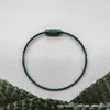Cuerda de alambre de acero galvanizado con pintura de color directo de fábrica llavero de color caramelo etiqueta bolsa cordón de llave de dibujos animados
