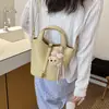 Bolso tipo cubo de estilo coreano súper popular y de nicho, nuevo modelo de verano 2026 para mujer, bolso de hombro y cruzado simple y elegante para el trabajo