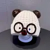 Bonitos y adorables gorros de otoño e invierno para niños, con diseño de poner, material de punto y una serie de dibujos animados, que brindan abrigo y protección para los oídos para bebés y niños pequeños.
