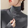 Suéter de capa base de cuello alto otoño e invierno nuevo estilo top de cuello de pelo jersey de manga larga tejido elegante ajuste ceñido tejido de punto blanco