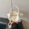 Bolso de mano tipo cubo de diseño de moda transfronterizo para mujer, nuevo diseño coreano de nicho, bolso de hombro y bandolera para el día a día