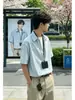 Suéter de dos piezas falsas estilo americano con cuello de solapa, camisa de manga corta a rayas para hombre, camisa casual versátil unisex estilo japonés