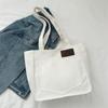 2023 Nueva Bolsa de Lona Artística Simple para Mujer Casual Color Sólido Simple Bolso de Hombro Gran Capacidad Tote para Viaje