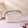 Nuevo neceser tipo bolso de mano de camelia, diseño apto para viajes, bolsa de almacenamiento de alta gama para cosméticos, labiales y llaves