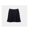 Falda versátil y de moda línea A anti-exposición para mujer, falda corta de lunares, nuevo estilo primavera-verano 2026, falda midi de cintura alta adelgazante para mujer en verano