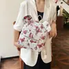 Bolso Cubo Casual Personalizado Estilo Coreano para Mujer Verano 2026 Nicho Nuevo Moda Estilo Académico Mochila con Estampado de Mariposas
