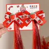 2026 Ano Novo Tassel Vermelho Grampo de Cabelo Crianças Saudação de Ano Novo Dança do Leão Presilha de Cabelo Acessório de Cabelo Meninas Estilo Antigo Hanfu Presilha Adorno de Cabeça